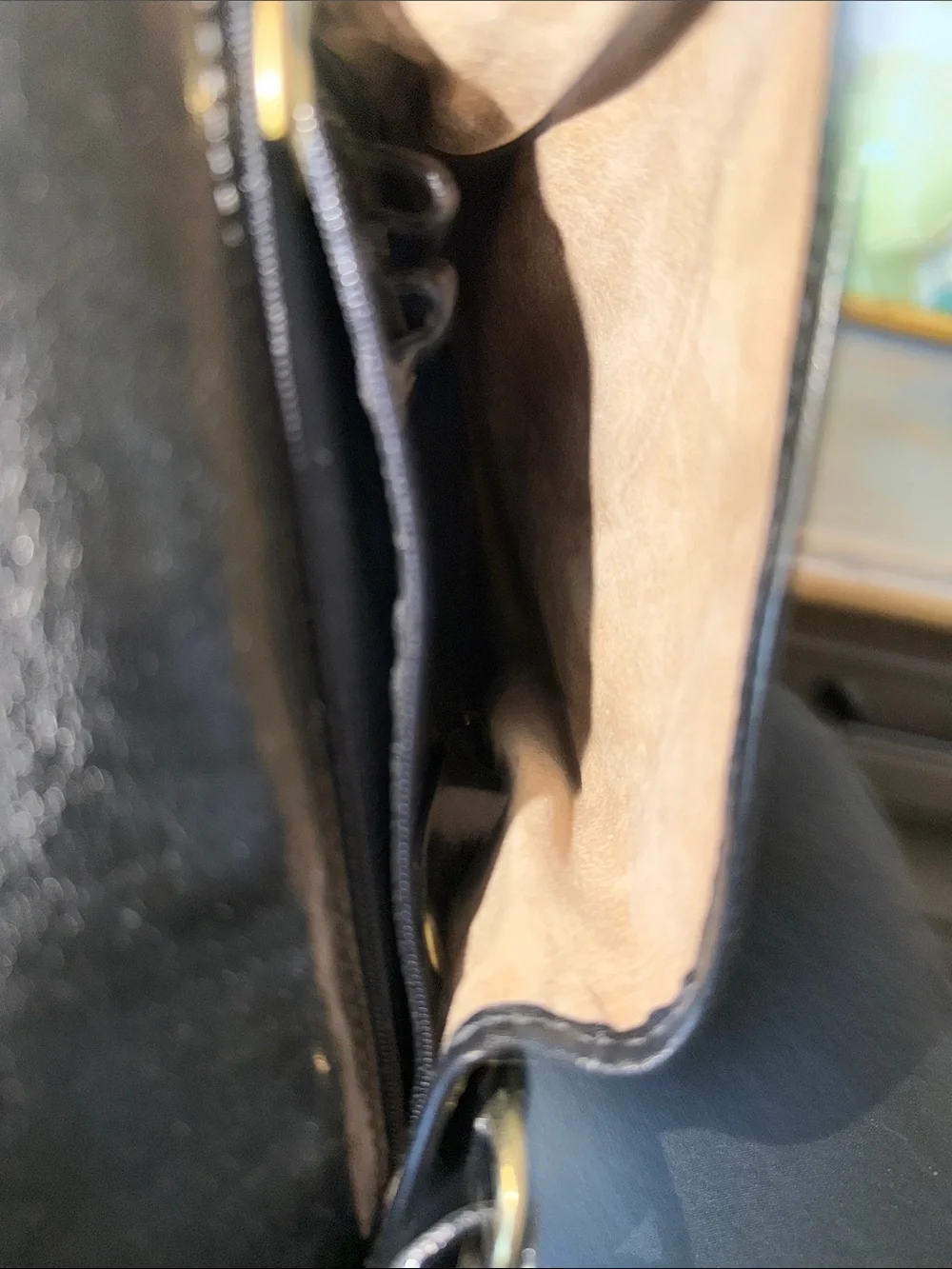 Brahmin Black Leather Messenger Bag with Gold Medallion